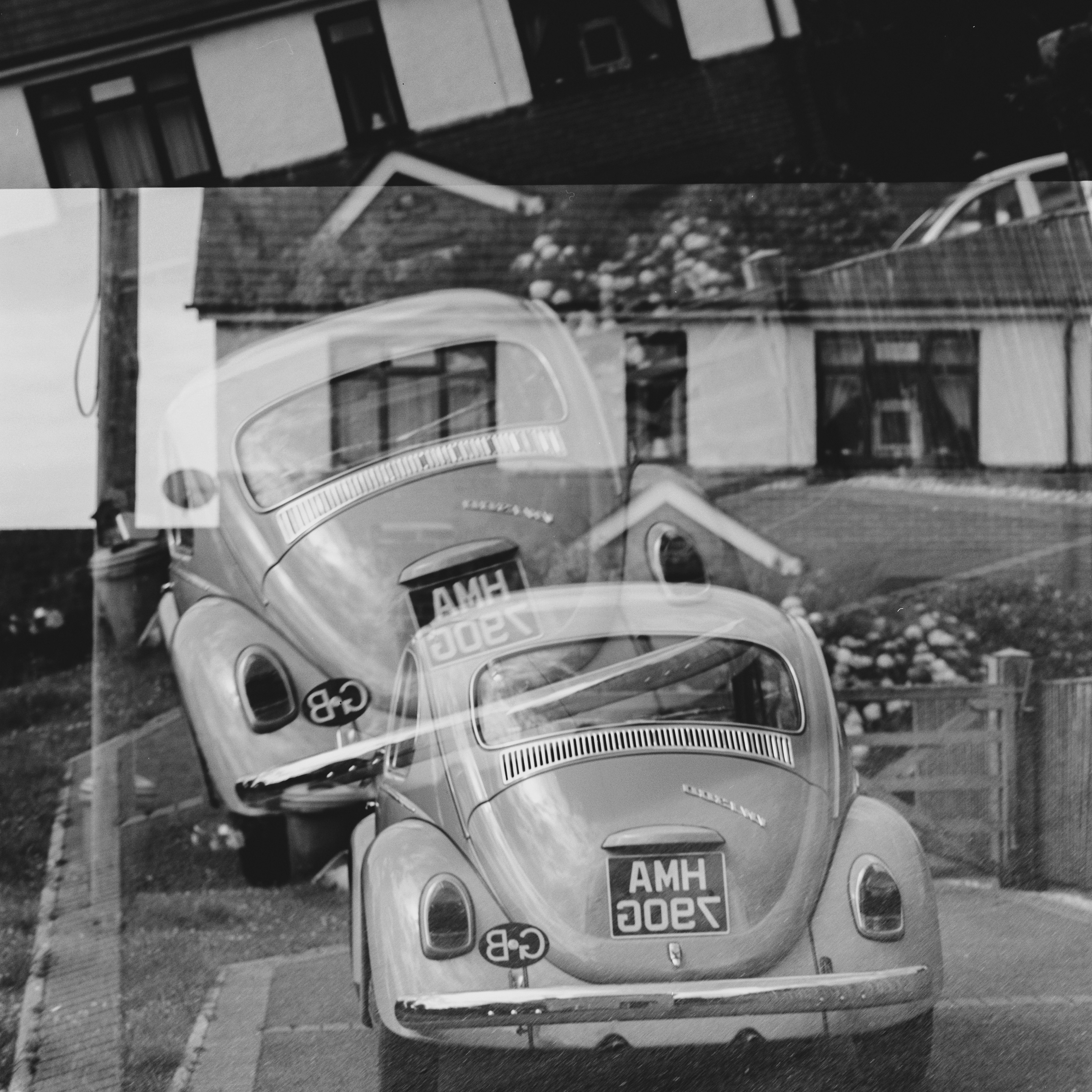 grayscale photo of volkswagen beetle